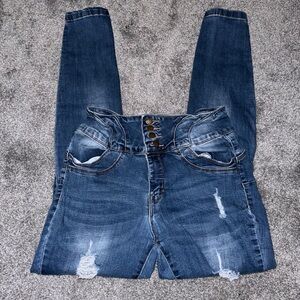 Medium washed ripped skinny jeans